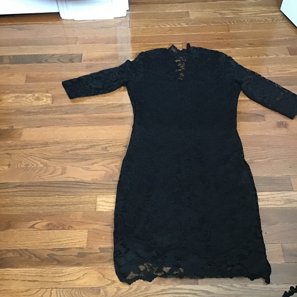 Woman’s black lace dress